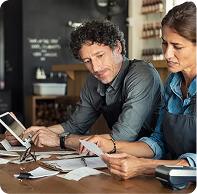A small business owner going over Schedule C tax preparation with Rapido Refunds